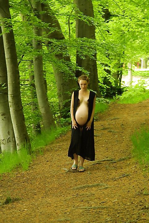 Cute pregger taking a walk in the forest #18724466