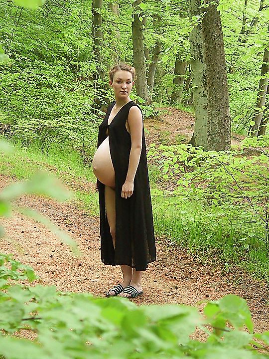 Cute pregger taking a walk in the forest #18724698
