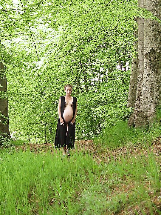 Cute pregger taking a walk in the forest #18724832
