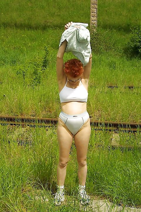 Preggy redhead posing inside and outside #17037787
