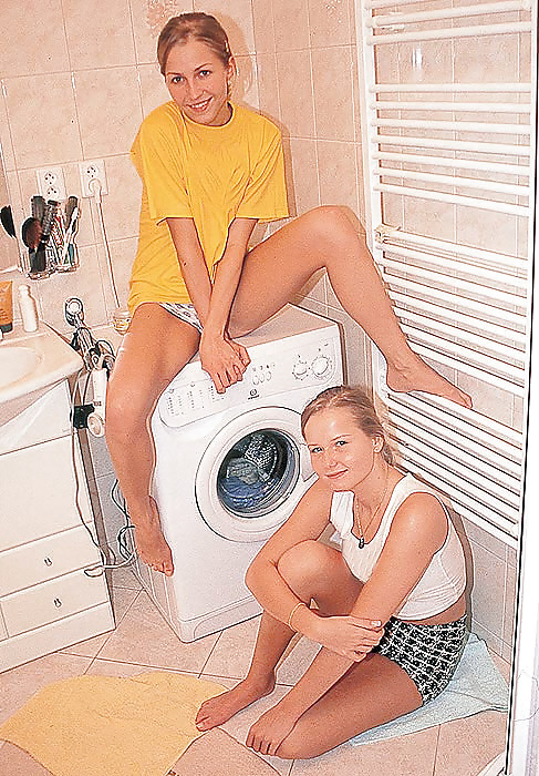 Anita & Sasha playing with each other in the utility room #15358660