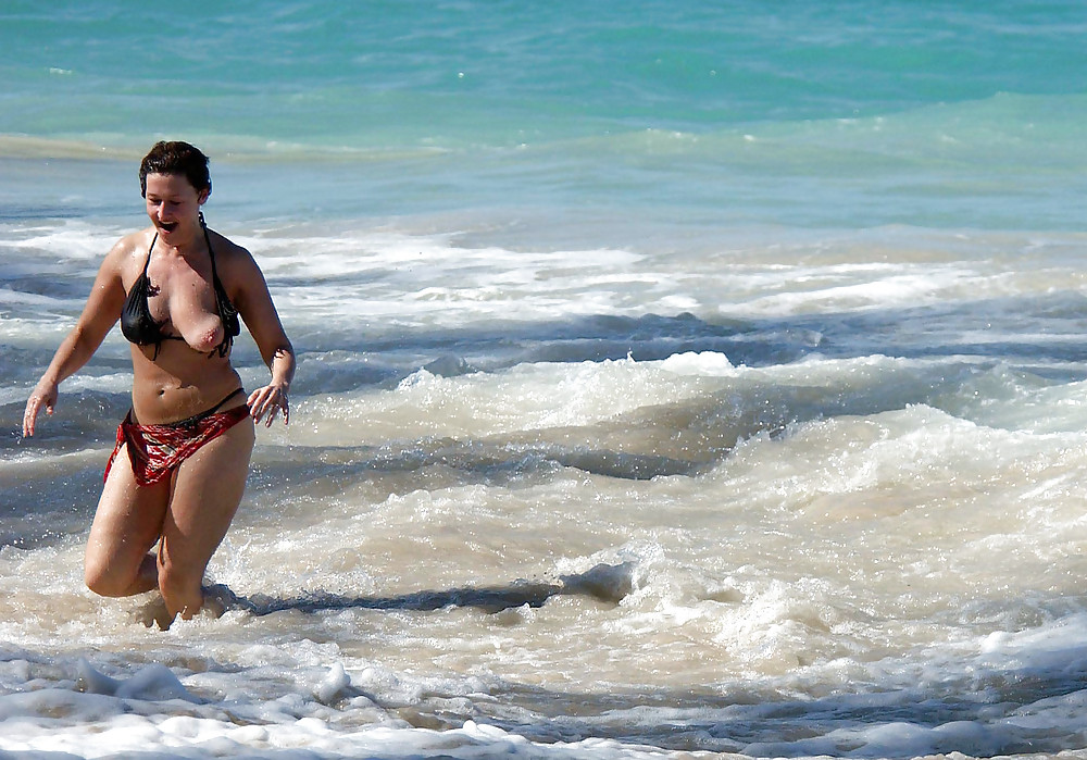 The power of waves. Bikini oops. #23886351