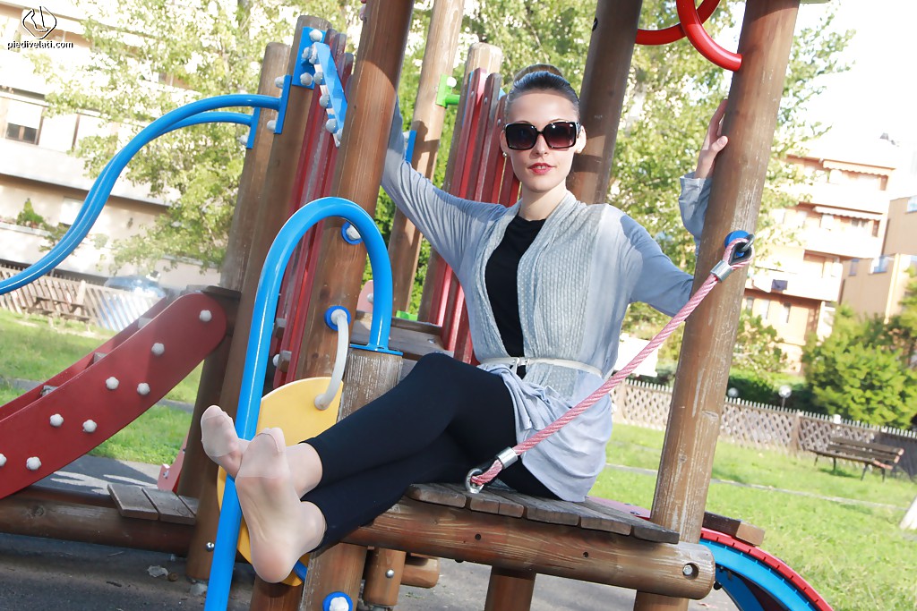 Christelle knows that you can do a lot of thing on the playground #51358272