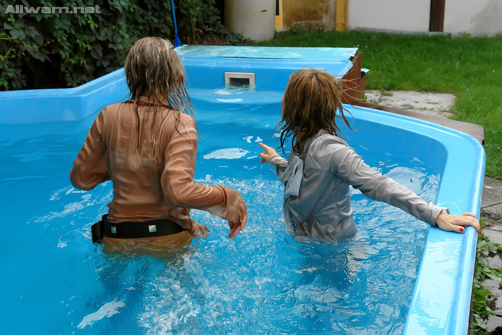 Tatiana Milovani has some fully clothed fun with her friend in the pool #50822004