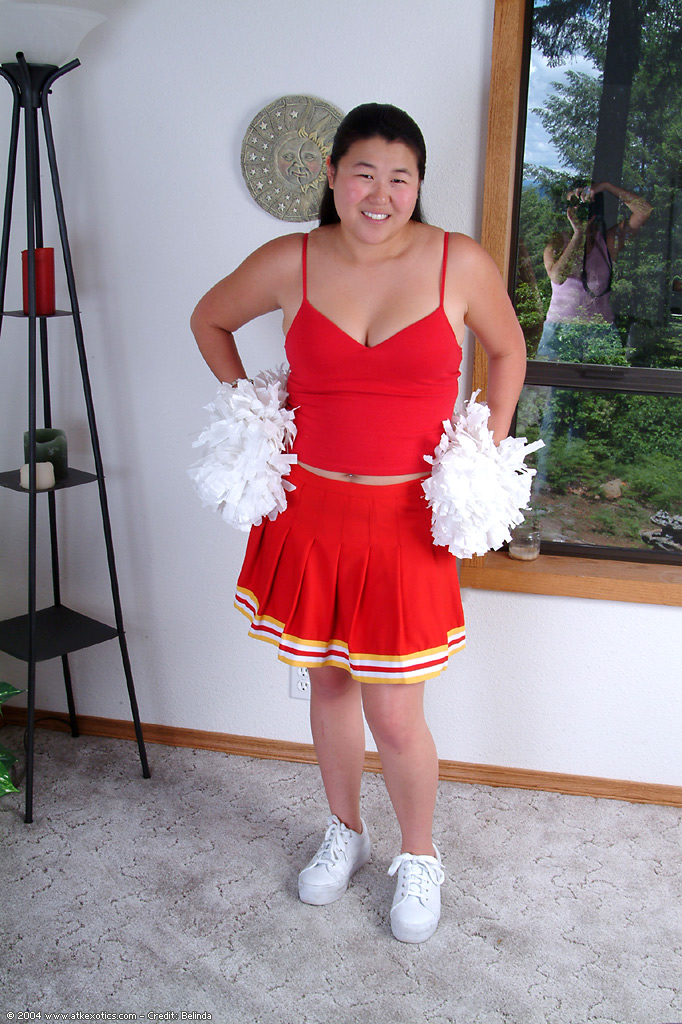 Chubby Asian first timer baring small boobs while shedding cheer uniform #50309747
