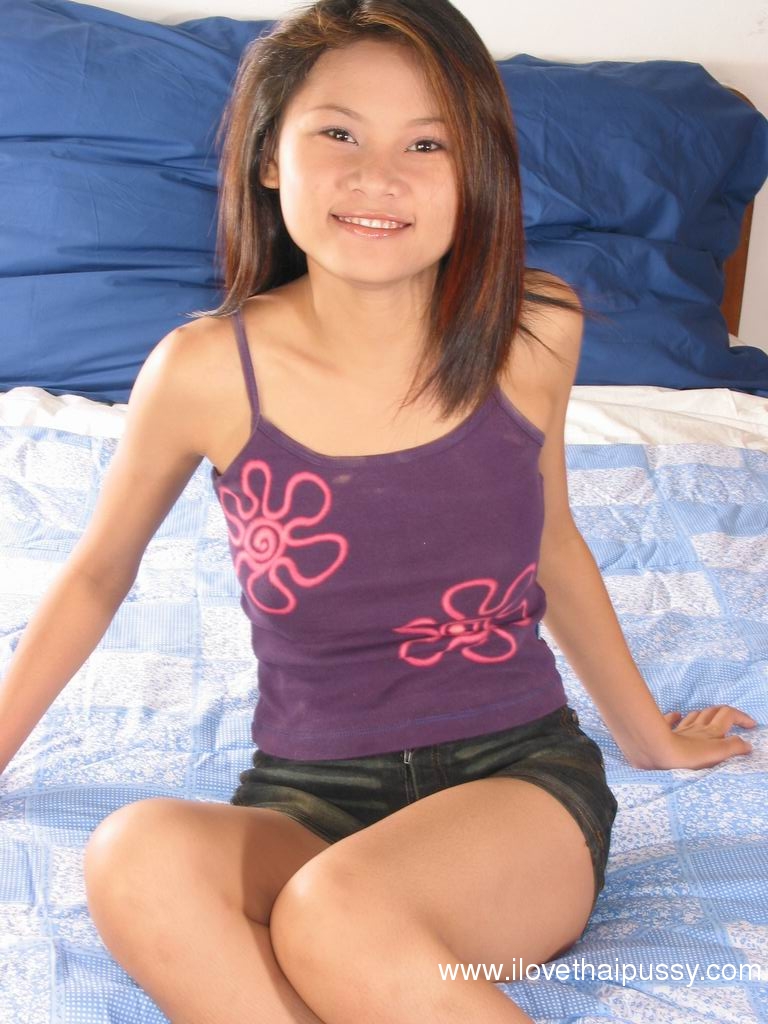 Teen Asian babe with big tits teases her hairy pussy while undressing #50055133