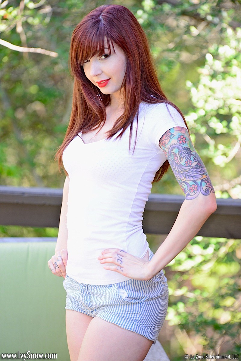 Ivy Snow warms up the weather in her shorts and small tank while she strips down #67362286