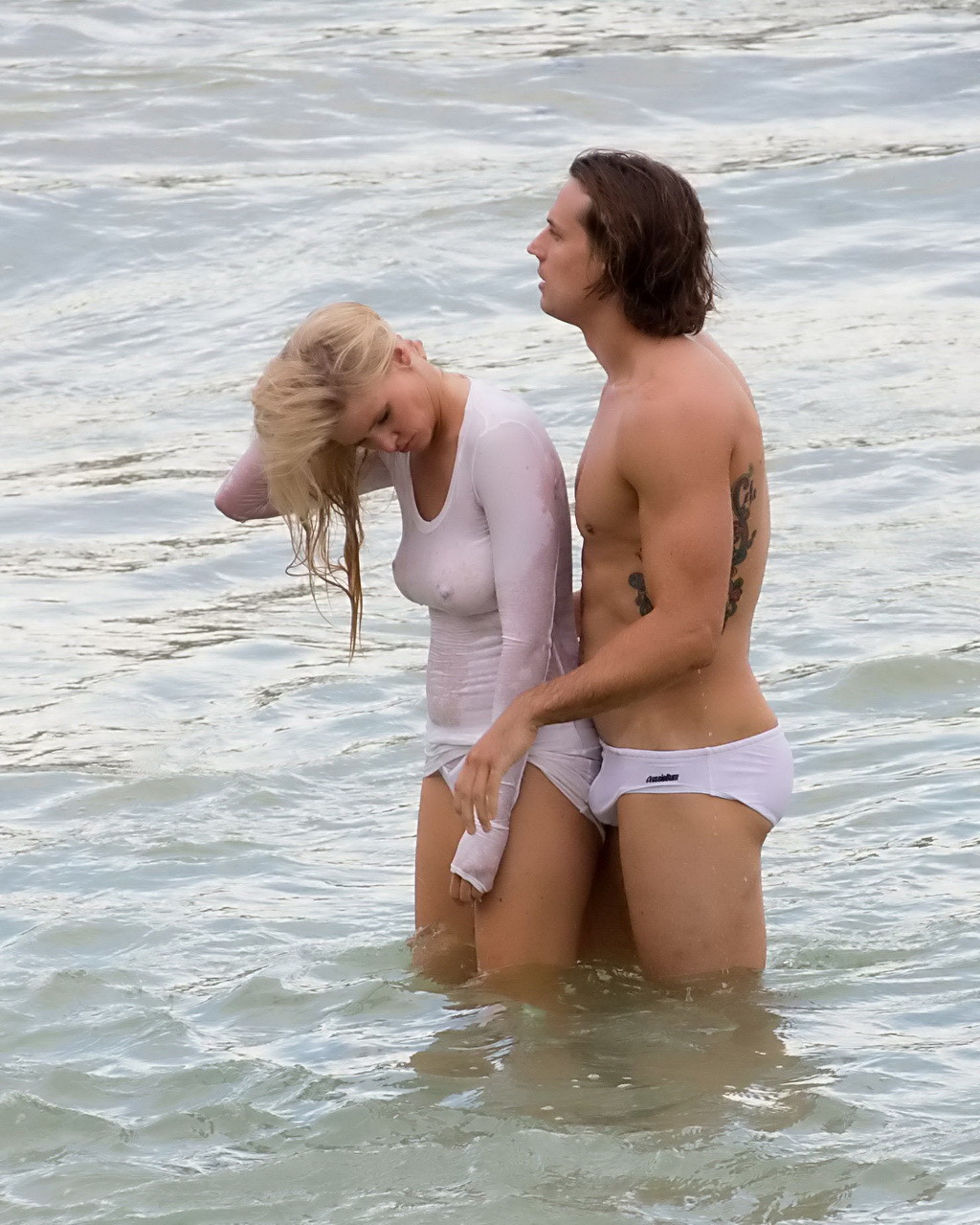 Lara Stone showing boobs in wet top and bikini bottom #75140045