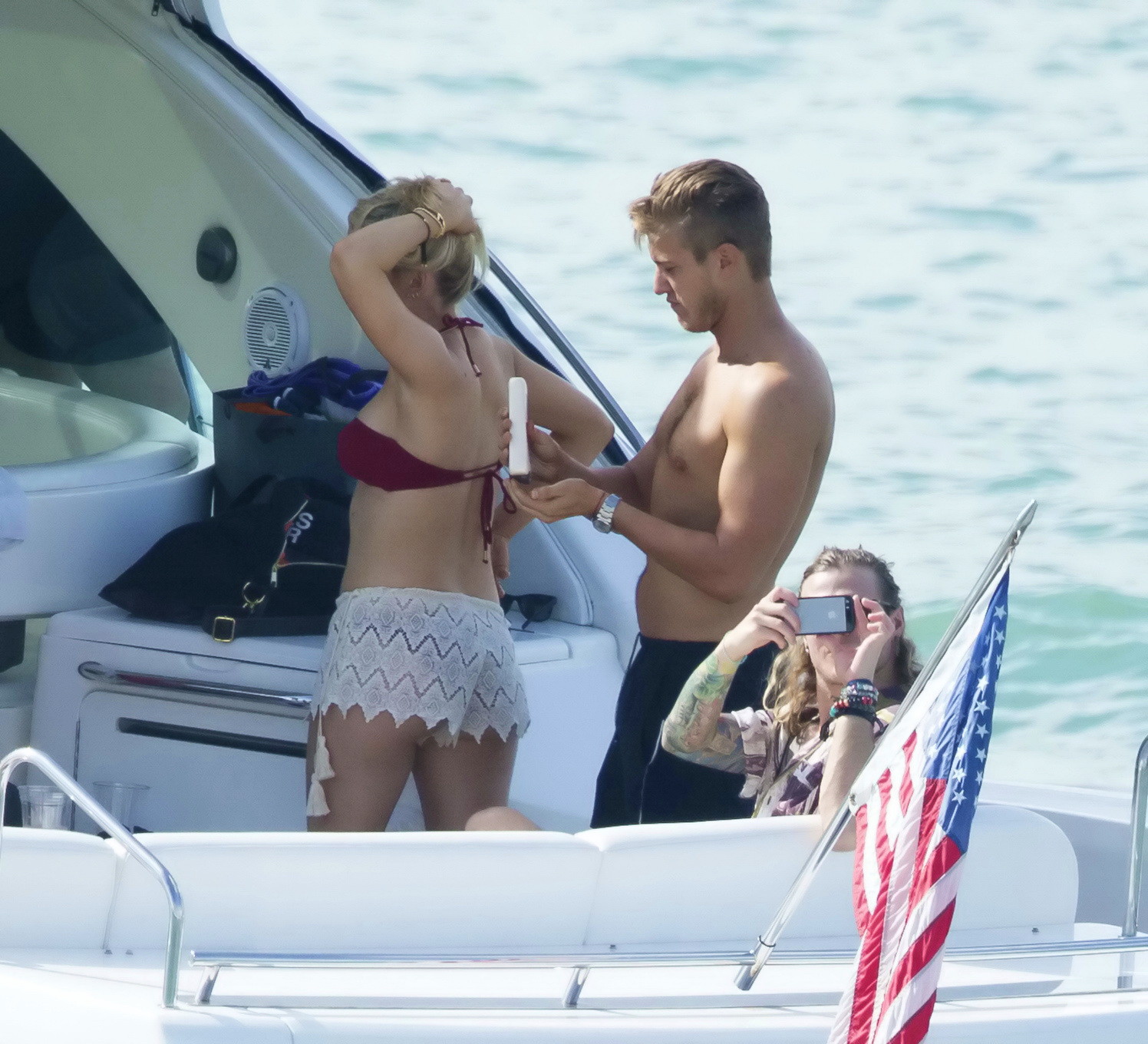 Ellie Goulding showing her ass in skimpy cherry colored bikini at the boat in Mi #75177143