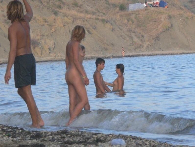 These two teens rub lotion on each other's bodies #72253634