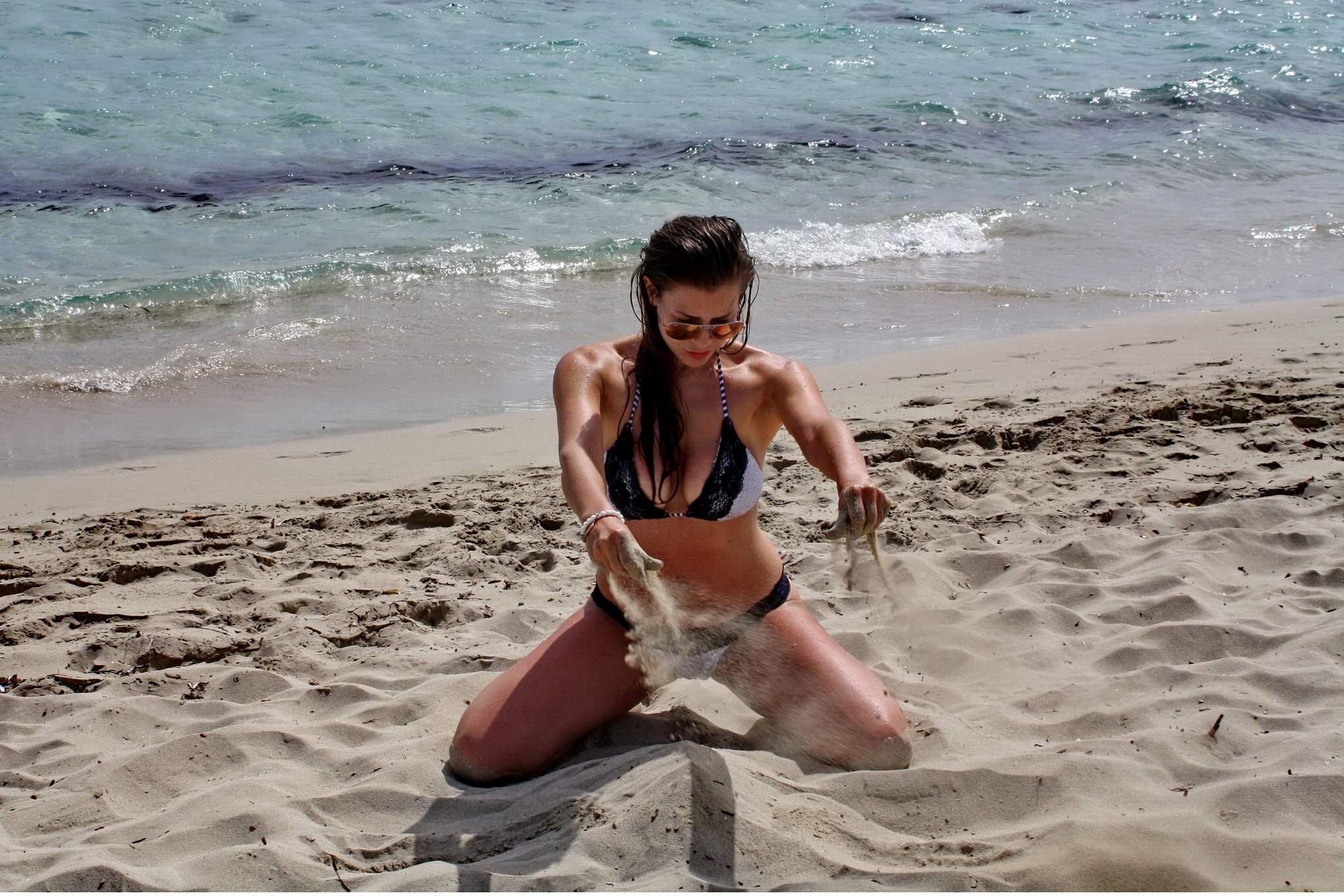 Imogen Thomas shows off her curvy body wearing a skimpy monochrome bikini on a b #75194447
