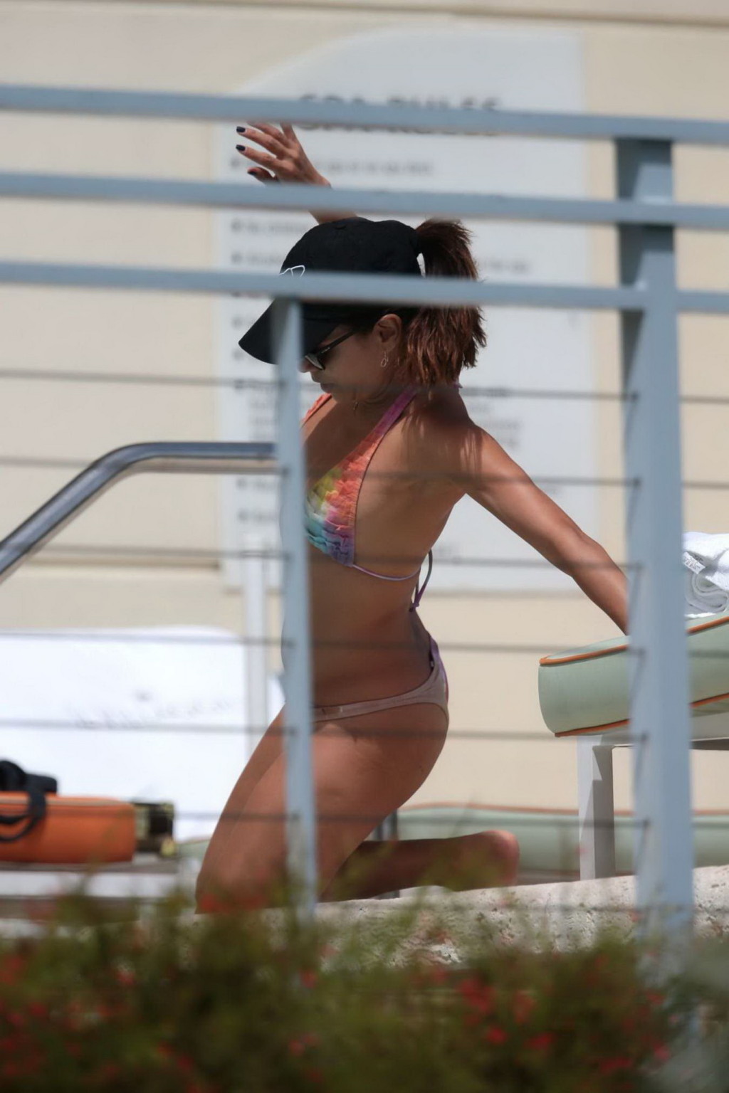 Eva Longoria caught in a tiny colorful bikini poolside in Miami #75185786