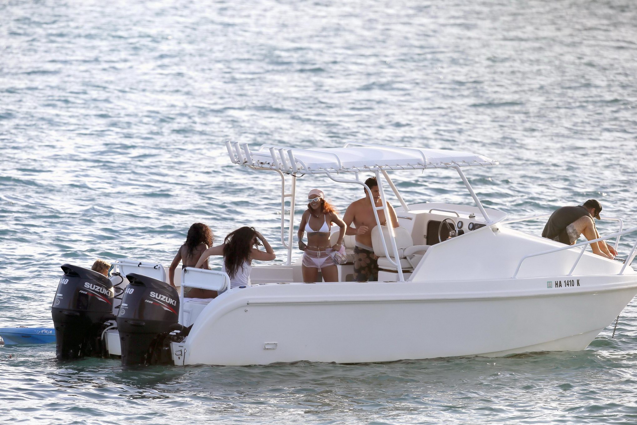 Rihanna showing sideboob and ass in skimpy white bikini at the beach in Hawaii #75165842