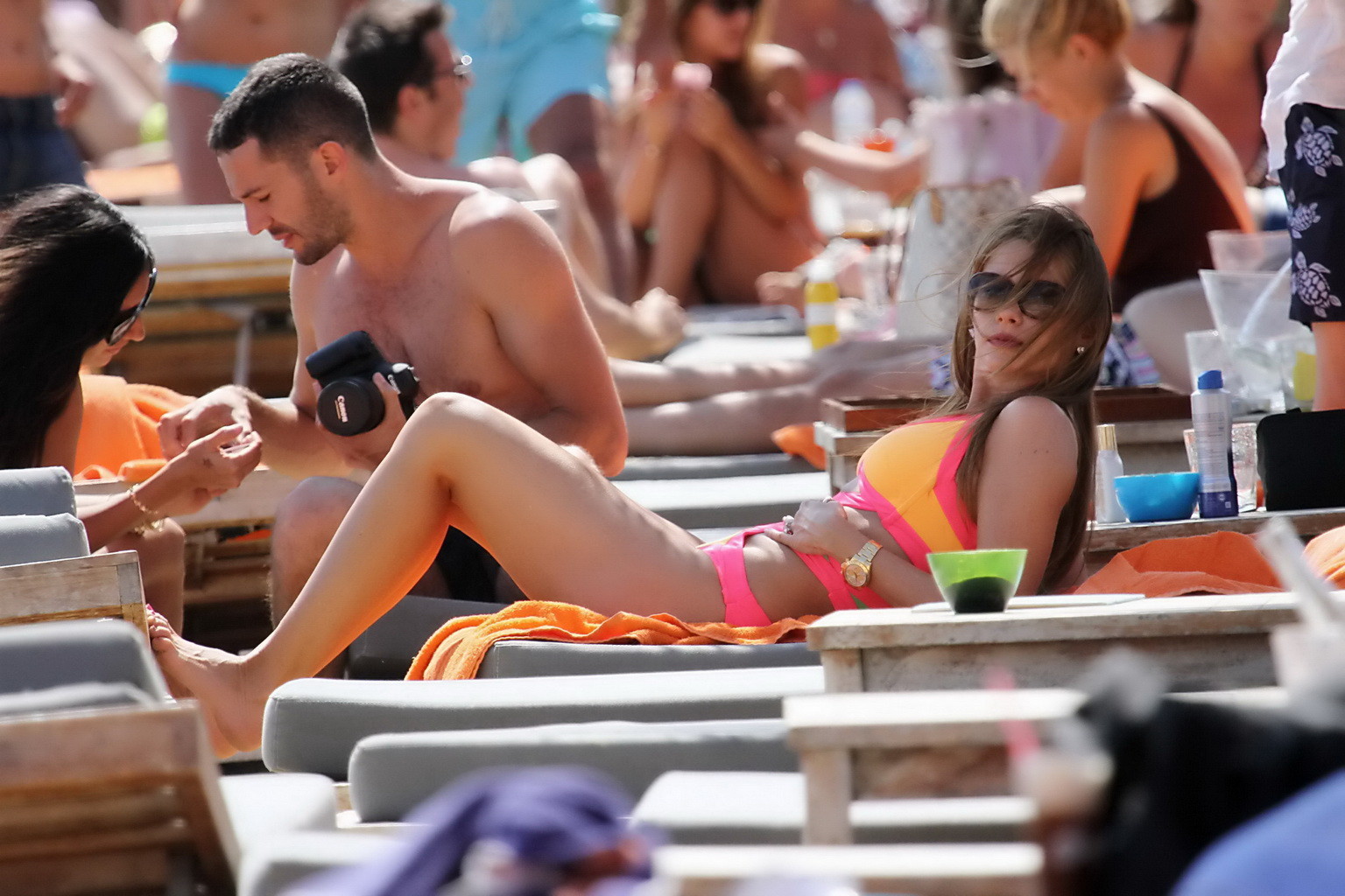 Sofia Vergara showing off her bust line in a colorful swimsuit at the beach in M #75224330