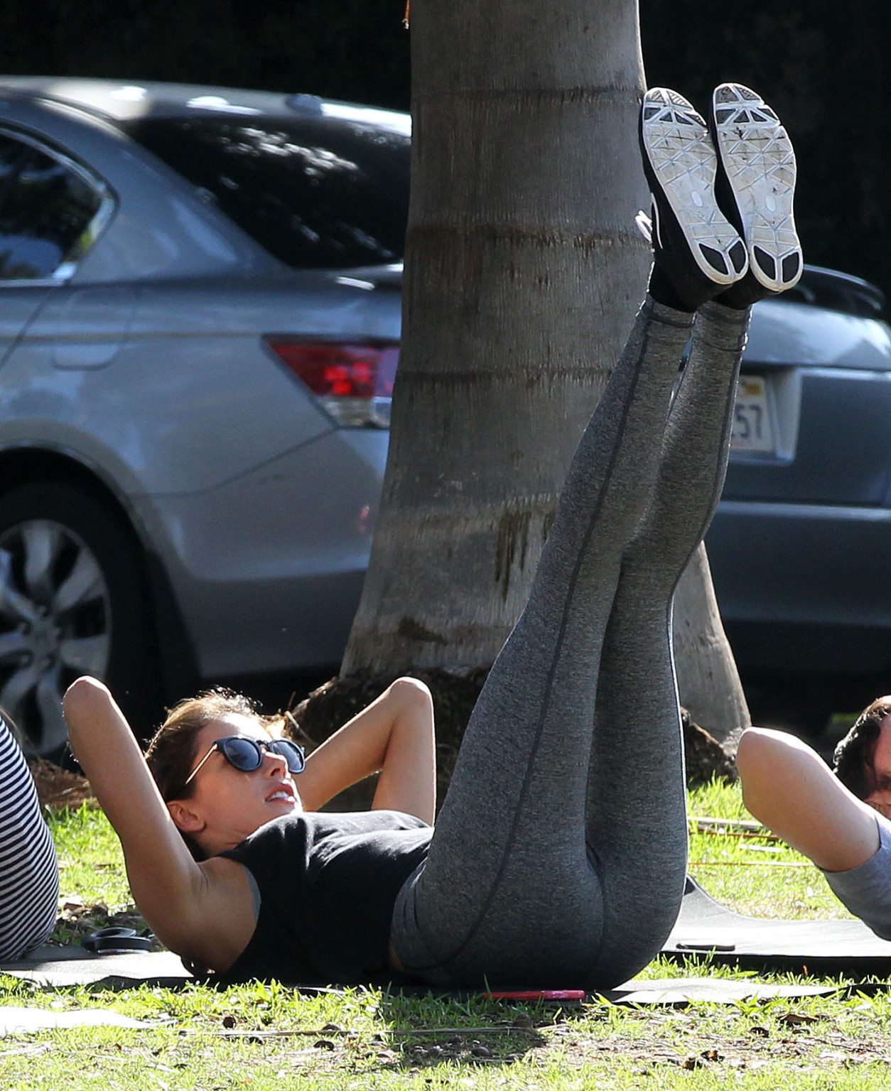 Alessandra Ambrosio shows off her ass in tights while working out at a park in S #75178928