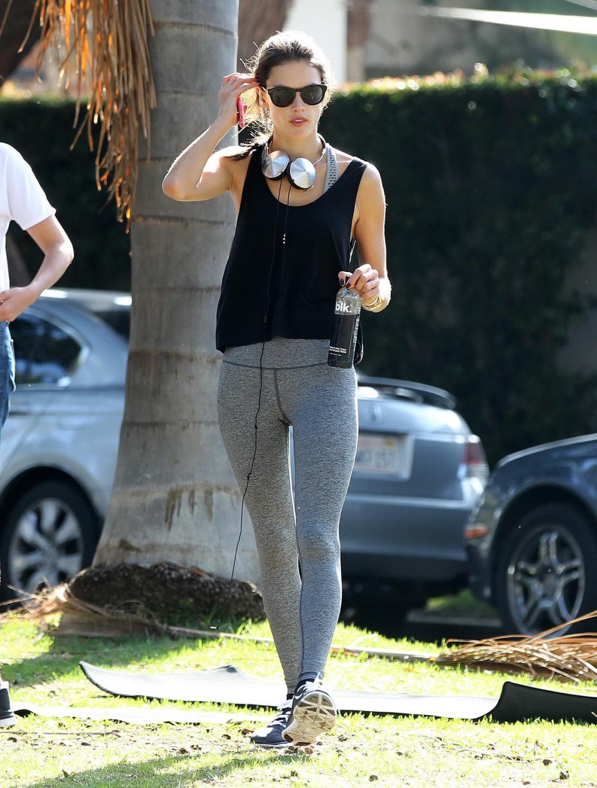 Alessandra Ambrosio shows off her ass in tights while working out at a park in S #75178997