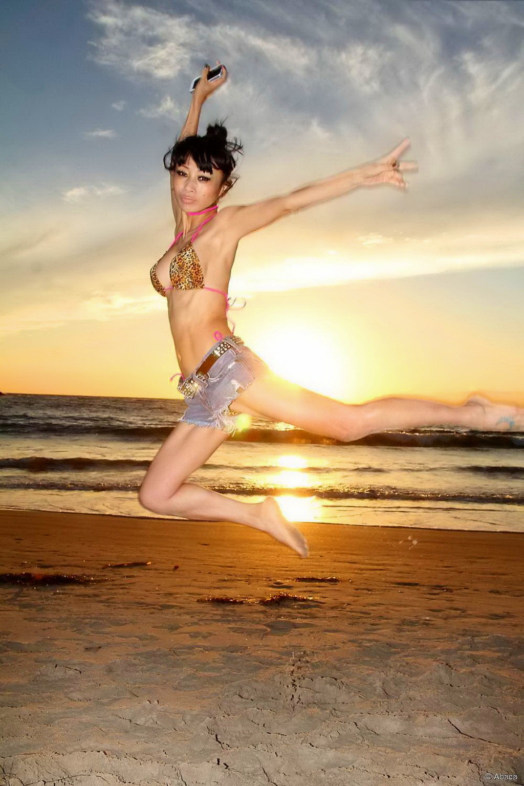 Bai Ling showing boobs in a seethru belly top and tiny leopard print bikini duri #75184400