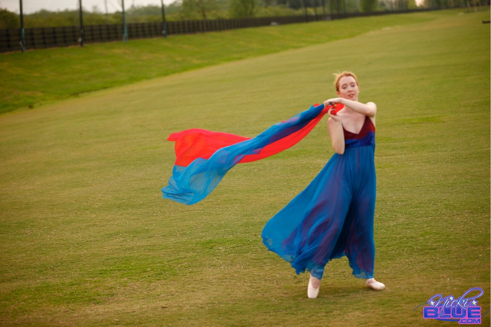I am doing ballet in the grass. In These photos you get to see #67903934