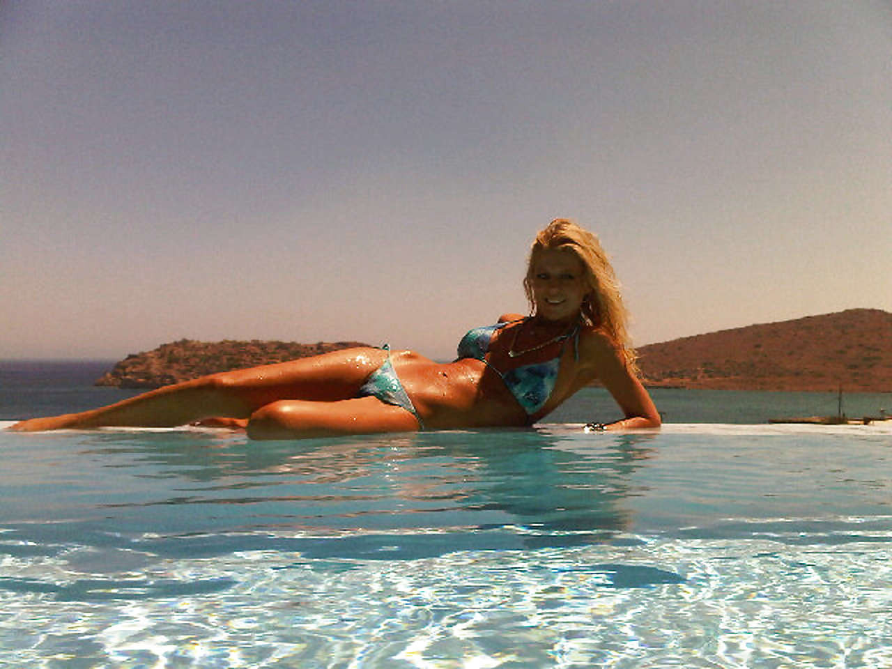 Tara Reid on bikini for Twitter picture and in see thru dress entering Big Broth #75290931