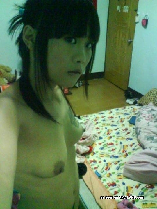 Petite Asian chick teasing and self-shooting naked #69751349