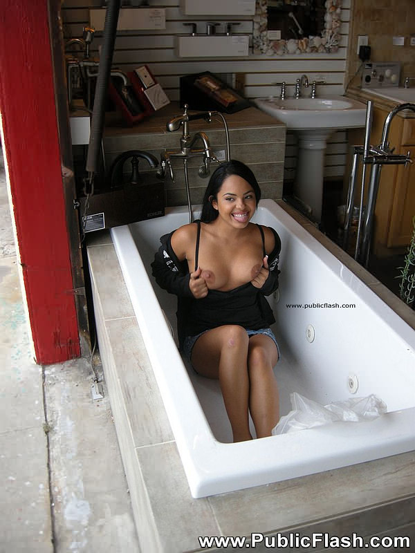 Petite latina flashing pointy tits an bits in city #77975469