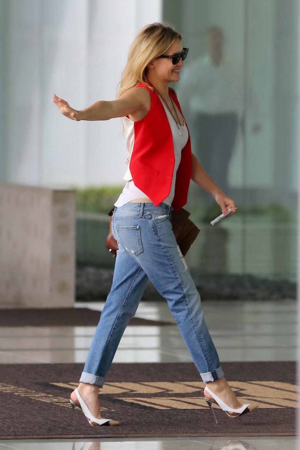 Kate Hudson showing big cleavage in skimpy white top and ripped jeans out in Cen #75169437