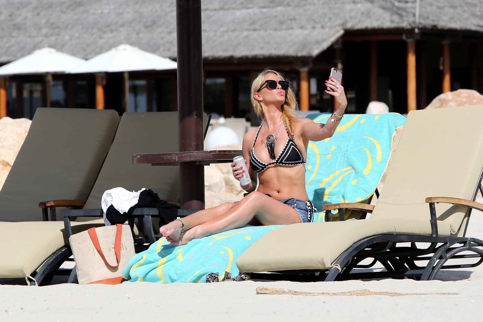 Sarah Harding busty in tiny monochrome bikini at a beach #75140631