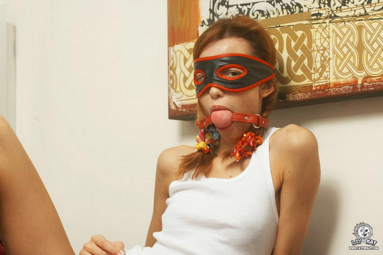 Pigtailed redhead lady in a mask pulling down her cute panties #72859115