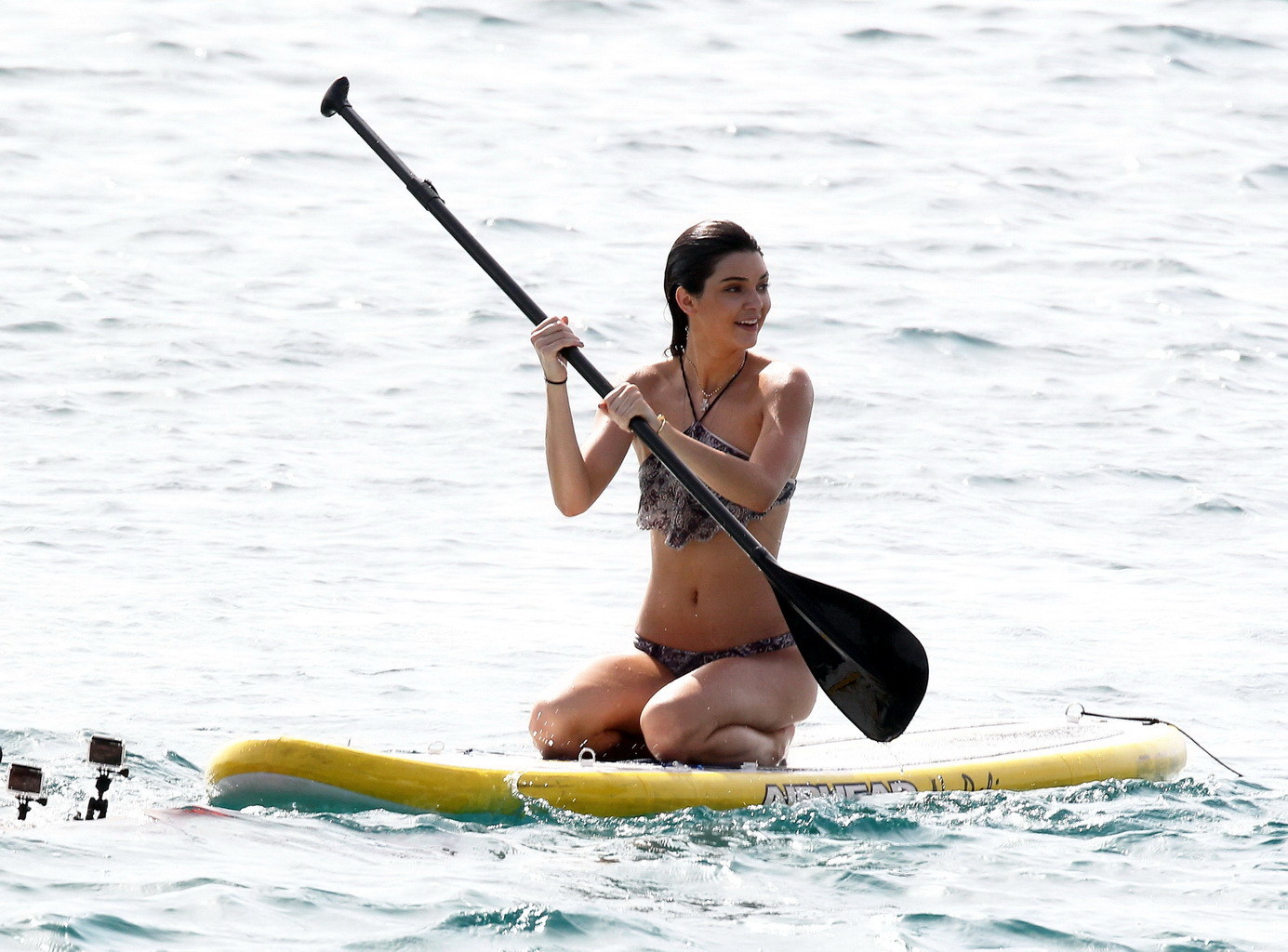 Kendall Jenner paddleboarding in bikini on a beach in St Barts #75154316