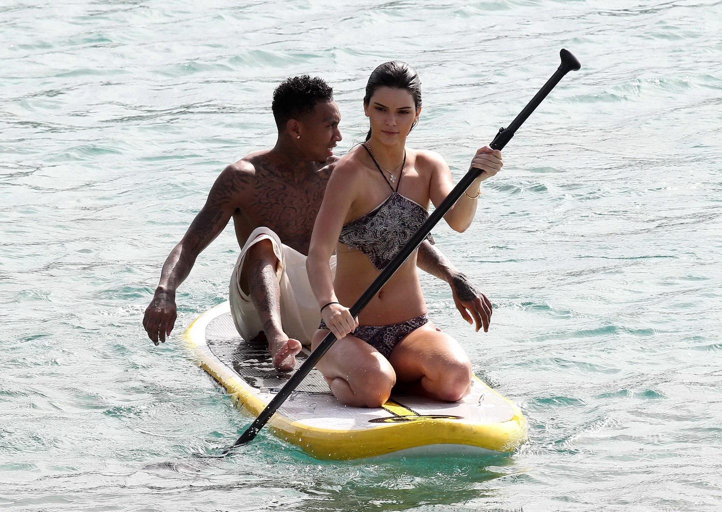 Kendall Jenner paddleboarding in bikini on a beach in St Barts #75154370