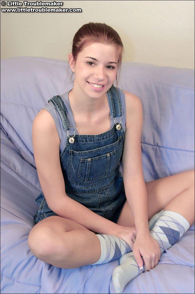 Pictures of Little Troublemaker getting naked on the couch #59920513