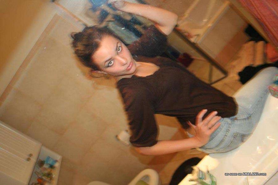 Hot big-tittied brunette chick self-shooting in front of a mirror #60657646